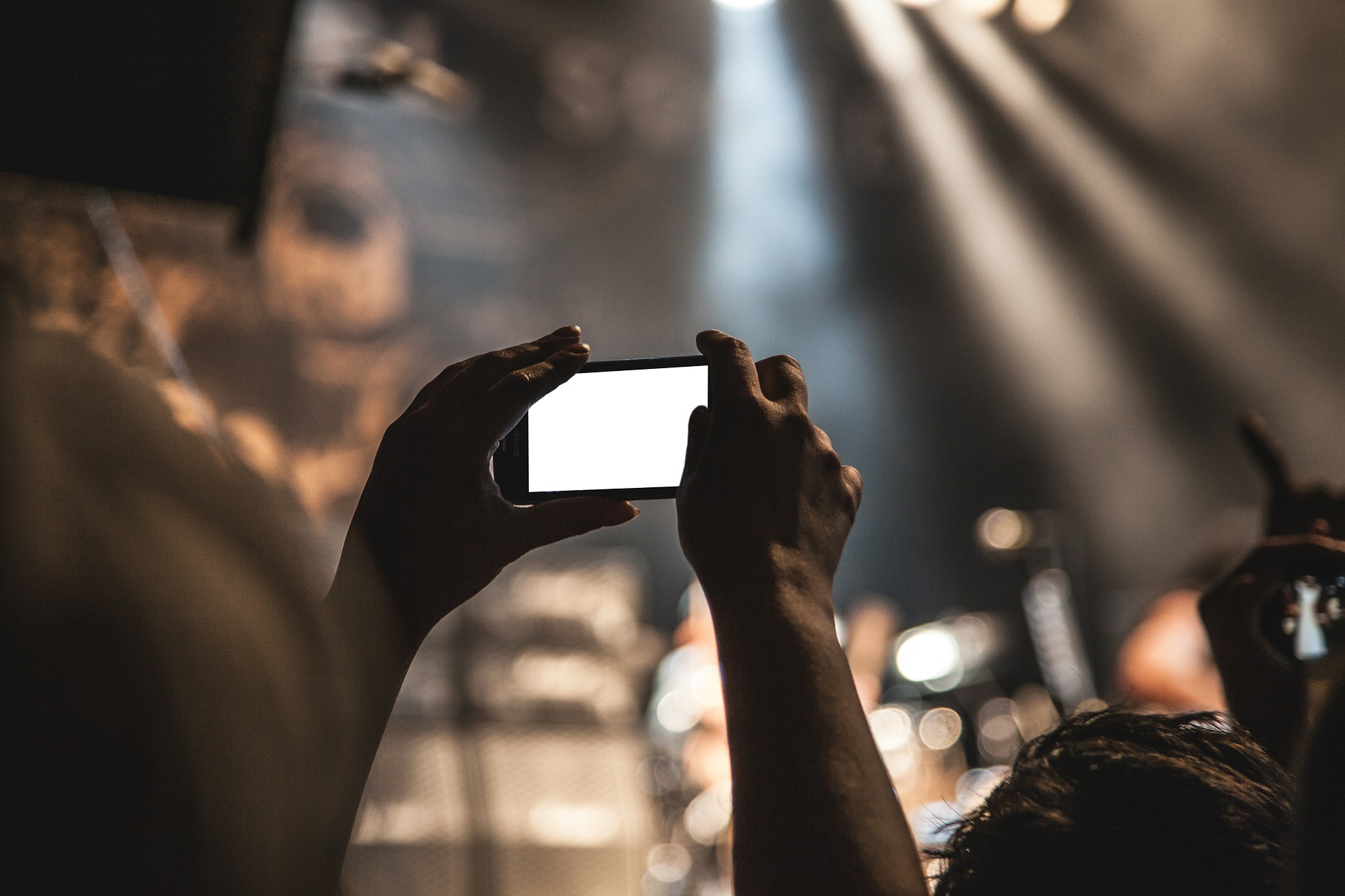 Taking a video during Ted Talk's